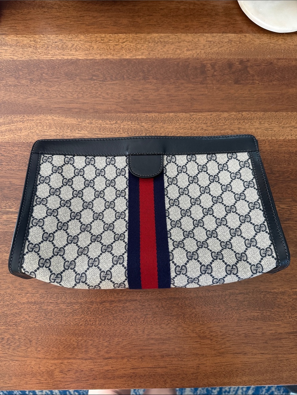Gucci Supreme Navy leather GG Canvas Clutch with Red and Navy Web stripe w/ CoA